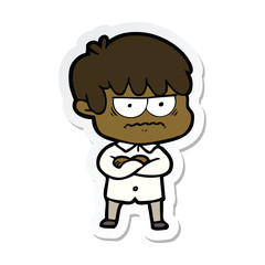 sticker of a annoyed cartoon boy
