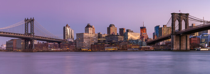 Dumbo panoramic from east river at sunset with long exposure