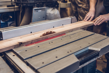 Carpentry workshop - technology work on the circular sawmill