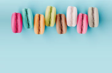 Photo sur Aluminium Macarons High detailed colourful macarons on blue background, vector illustration