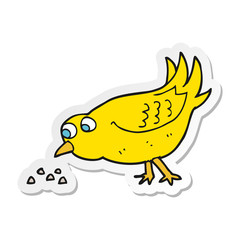 sticker of a cartoon bird pecking seeds