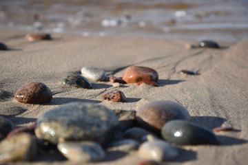 Fototapeta na wymiar Pebble stones by the sea.