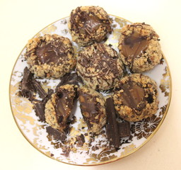  chocolate-nut cookies on a plate top view