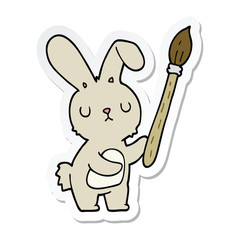 sticker of a cartoon rabbit with paint brush