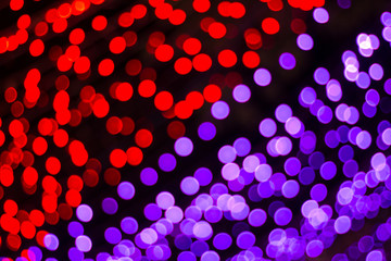 The light red bokeh blurred abstract light background