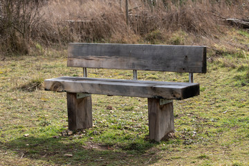Naklejka premium wooden bench in the park