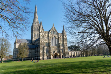 Fototapeta na wymiar Salisbury, Wiltshire, England, UK. February 2019. Salisbury Cathedral and grounds viewed from the west walk