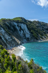 A hidden beach at the blue coastline of Sardinia, Italy