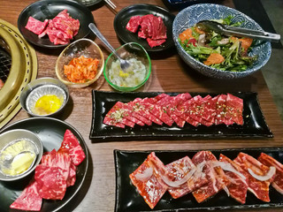 Various premium Japanese Wagyu marbling grilled beef yakiniku fire pot in Tokyo Japan