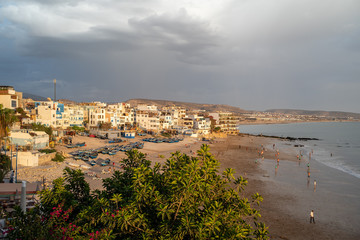 Fototapeta na wymiar The small and sandy beach of Taghazout, Morocco