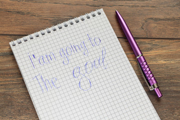  a pen on a notebook with the inscription I'm going to the goal