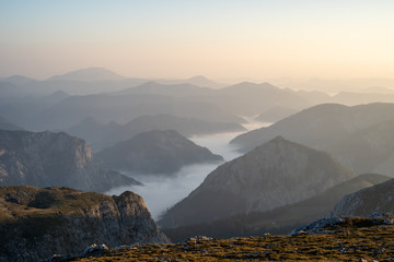 The foggy valley next to the Hochschwab moutain in the early morning, Austria