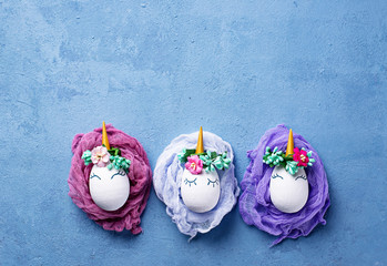 Easter eggs in shape of unicorn © Yulia Furman