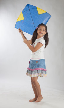 Indian Girl Child Flying Kite