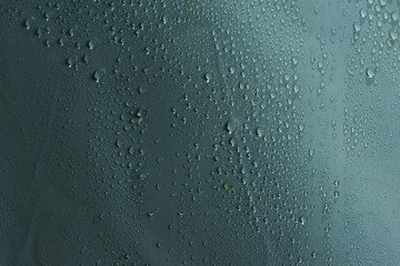 Water drops close up. Abstract white background of waterdrops