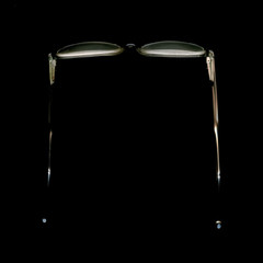 glasses spectacles over black