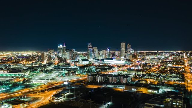 Aerial Night Time-Lapse of Denver Colorado with traffic.