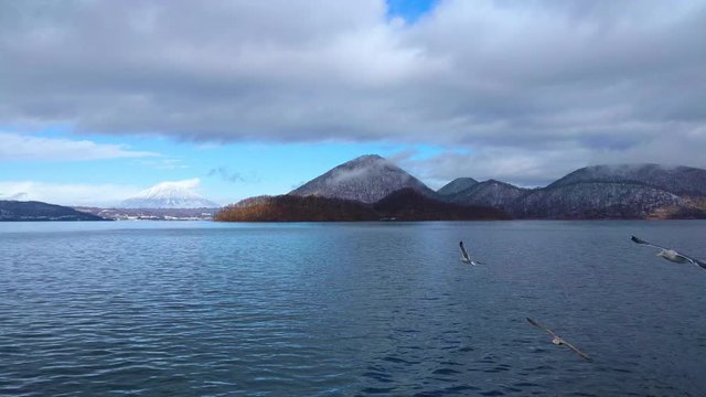 View of Mount Yotei from Lake Toya, taken from a moving cruise