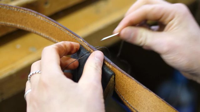 Saddler, saddle stitching