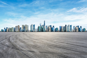 Asphalt road ground and panoramic city skyline with buildings in Shanghai