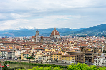 Fototapeta na wymiar Panaromic view of Florence townscape cityscape viewed from Piazzale Michelangelo (Michelangelo Square) with magnificent Renaissance dome designed by Filippo Brunelleschi