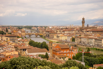 Panaromic view of Florence townscape cityscape viewed from Piazzale Michelangelo (Michelangelo Square) with ponte Vecchio and Palazzo Vecchio