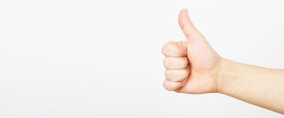 Hand with thumb up isolated on white background - like sign.