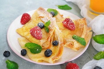 Homemade Crepes with fresh fruits and berries, selective focus