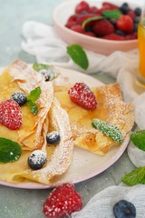 Homemade Crepes with fresh fruits and berries, selective focus