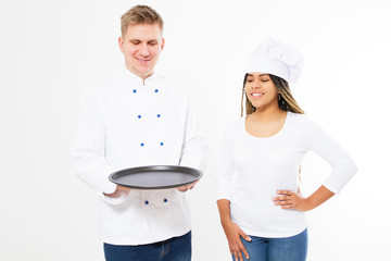 smile black female and white male chefs cooks hold an empty tray isolated on white background