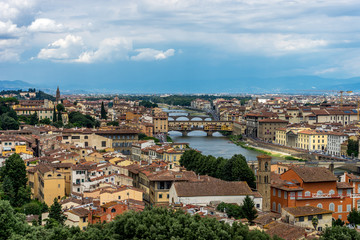 Panaromic view of Florence townscape cityscape viewed from Piazzale Michelangelo (Michelangelo Square) with ponte Vecchio and Palazzo Vecchio with lightningPanaromic view of Florence townscape citysca
