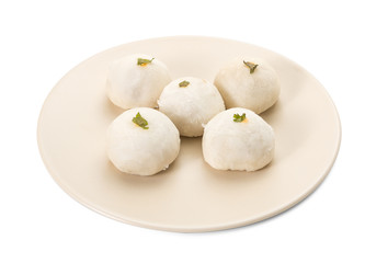  chinese pastry on white plate against white background