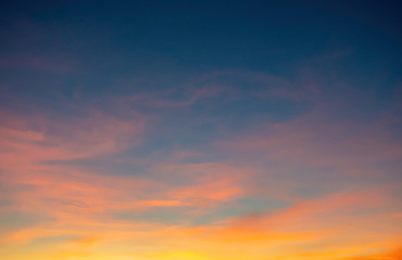 Sunset the evening light through the clouds