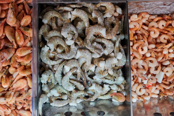 Frozen shrimp in the refrigerator grocery store