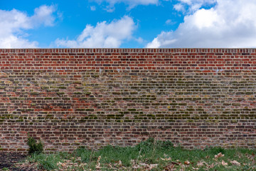 red wall and blue sky