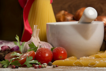 still life pasta, garlic, olive oil, tomatoes, cheese