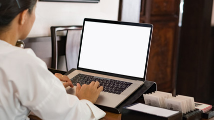 Staff working in front of the computer