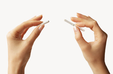 broken cigarette in half in two parts