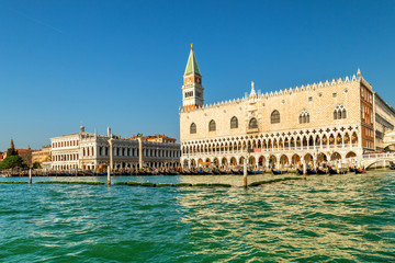 Fototapeta na wymiar Doge's palace and St Mark's Campanile, the bell tower of St Mark's Basilica in Venice, Italy