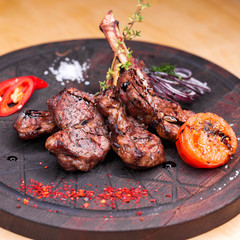 Big piece of lamb on the bone - restaurant dish lamb grilled lamb grilled