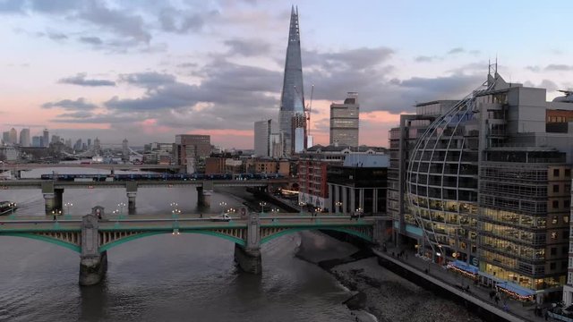 Aerial view of The Shard Building and the Southwark Bridge after sunset