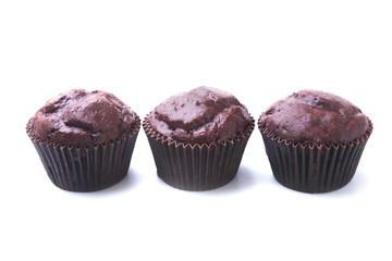 chocolate muffins, cupcake with chocolate chips isolated on white background. Delicious homemade muffins.