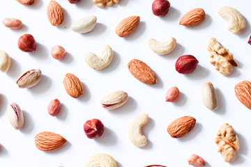 Pattern of nuts mix: cashew, hazelnuts, walnuts, almonds 
