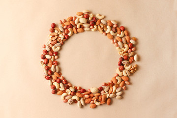 Cashew, hazelnuts, walnuts, almonds in circle form. Top view or flat-lay. Copy space