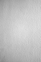 The textured white wall with a little stain and dirty