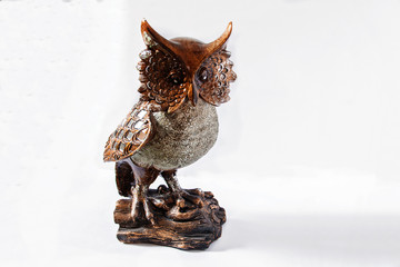 Decorative statuette of an owl made of wood.