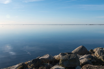 Absolutely calm water by the coast