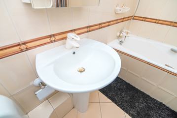 The photo of a sink in a bathroom