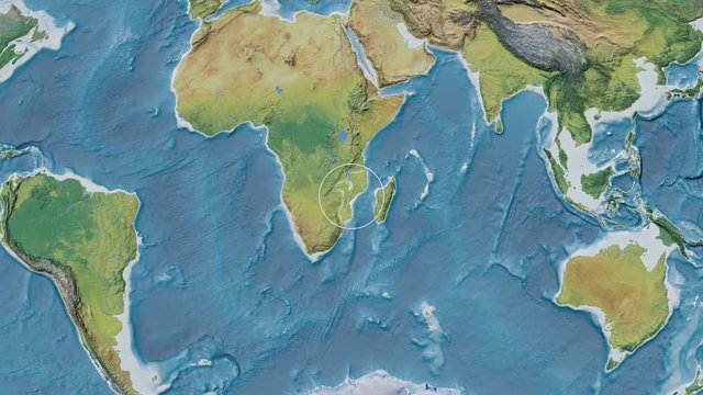 Mozambique area presented against the global topographic map in the Fahey projection with animated oblique transformation