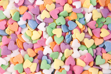 Fototapeta na wymiar Colorful sweet candy hearts background